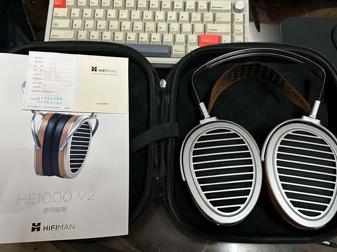 Hifiman HE1000 v2 (Non-Stealth) (Category: Headphones & Headsets) located in Manila. Submitted by daledeseeko (Listing ID 1464743539, Image 1). Description: Selling my TOTL Hifiman HE1000 v2 (Non-Stealth, 3.5mm) - 2nd owner here. No issues whatsoever. Have minor scuffs and paint chips from normal wear. - Does not include original packaging, but will include a third party carrying case as shown in the picture. - Pads are in great shape, but the le