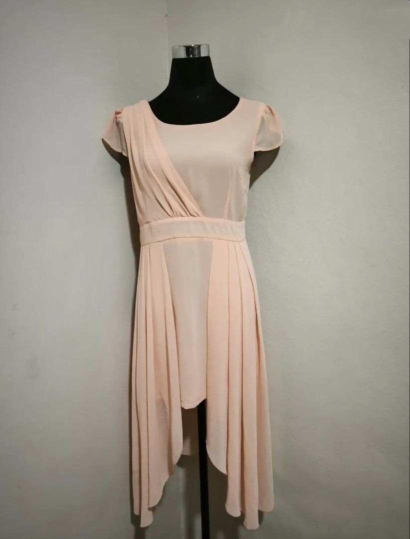 High-low peach dress (Category: Dresses) located in Manila. Submitted by wearforce (Listing ID 1464592837, Image 2). Description: High-low peach dress can fit M-L good condition no issues color rate 9/10 150 + sf.