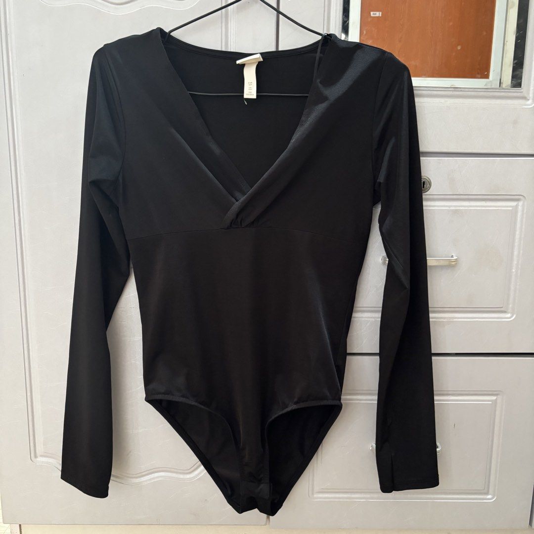 H&M Black Silk Wrapover Bodysuit (Category: Longsleeves) located in Binan City. Submitted by mypreloved_haul (Listing ID 1464626854, Image 1). Description: LAST PRICE POSTED! FOR SURE BUYERS ONLY.
