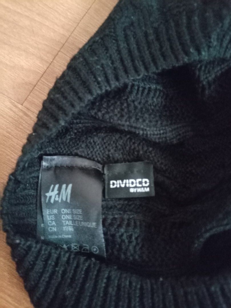 H&M Divided Black Knit Beanie Hat One Size (Category: Hats & Beanies) located in Makati City. Submitted by meowmyella (Listing ID 1464625297, Image 2). Description: - Brand: H&M Divided - Color: Black - Style: Cable knit beanie with open weave details - Material: Soft and stretchy - Size: One size fits most - Features: Keeps you warm, classic design.