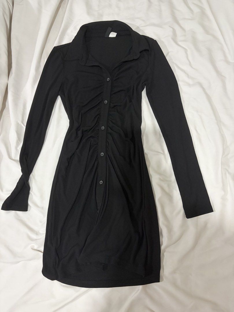 H&M Divided Black Ribbed Button-Down Dress Size S (Category: Dresses) located in Quezon City. Submitted by floresdette (Listing ID 1464709843, Image 1). Description: - Brand/Model: H&M Divided - Color: Black - Size: S (true to size) - Material: Stretchy ribbed knit - Design: Collared neckline, button-down front, and center ruching - Style: Versatile mini dress for casual wear or going out.