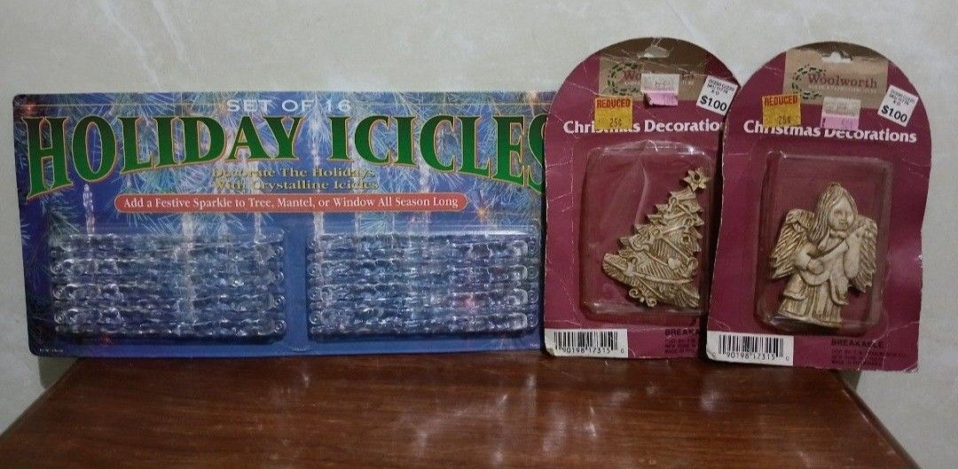 Holiday Icicles & Woolworth Christmas Decorations Set (Category: Vintage Collectibles) located in Bulacan. Submitted by honhonliz (Listing ID 1464686331, Image 1). Description: - Set of 16 Holiday Icicles - Includes 2 Woolworths Christmas Decorations: 1 Tree, 1 Angel - Original Packaging for all items - Ideal for decorating your home, tree, or mantelpiece - Adds sparkle and festive cheer to your holiday decor.