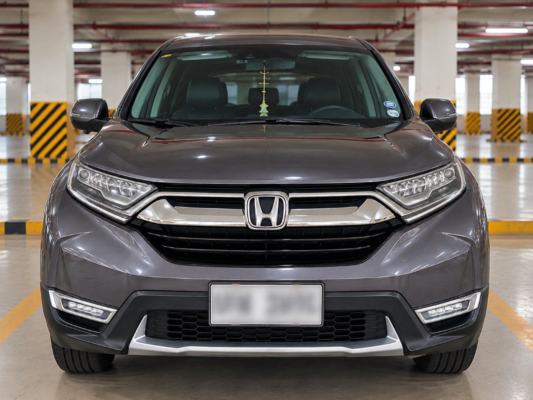 Honda CR-V 1.6 Diesel Auto (Category: Used Cars) located in Manila. Submitted by firedragon716 (Listing ID 1464691995, Image 2). Description: FOR SALE: 2019 Honda CR-V 1.6 Diesel – 7 Seater • 45,521 km only • 1.6 Diesel, Automatic • 7-seater • Modern Steel Metallic / Gray • Leather seats • Push-button start • Low mileage for its age • Monday coding • Second owner • 1 key only • Complete documents • With normal signs of use / minor scratches consi