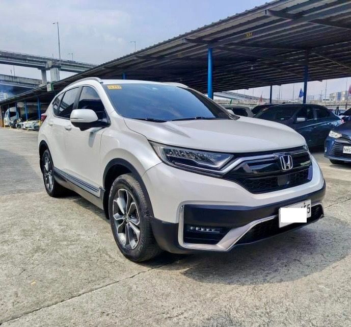 Honda CRV SX AWD Auto (Category: Used Cars) located in Quezon City. Submitted by jayjet.jayjet (Listing ID 1464588541, Image 2). Description: 2022 HONDA CRV SX AWD Automatic Transmission All wheel drive 42tkm Diesel Engine Panoramic Sunroof Push Start All Power All Original No Issues No Accidents Mechanic Inspected Complete Tools and Spare tire Price P1.198m Slightly negotiable upon viewing Financing/Trade-In Accepted Sample Financing Computation