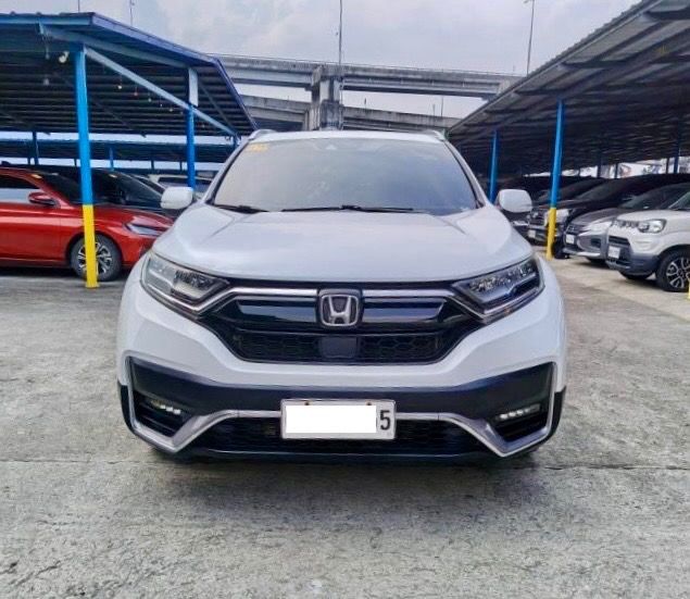 Honda CRV SX AWD Auto (Category: Used Cars) located in Quezon City. Submitted by jayjet.jayjet (Listing ID 1464588541, Image 3). Description: 2022 HONDA CRV SX AWD Automatic Transmission All wheel drive 42tkm Diesel Engine Panoramic Sunroof Push Start All Power All Original No Issues No Accidents Mechanic Inspected Complete Tools and Spare tire Price P1.198m Slightly negotiable upon viewing Financing/Trade-In Accepted Sample Financing Computation