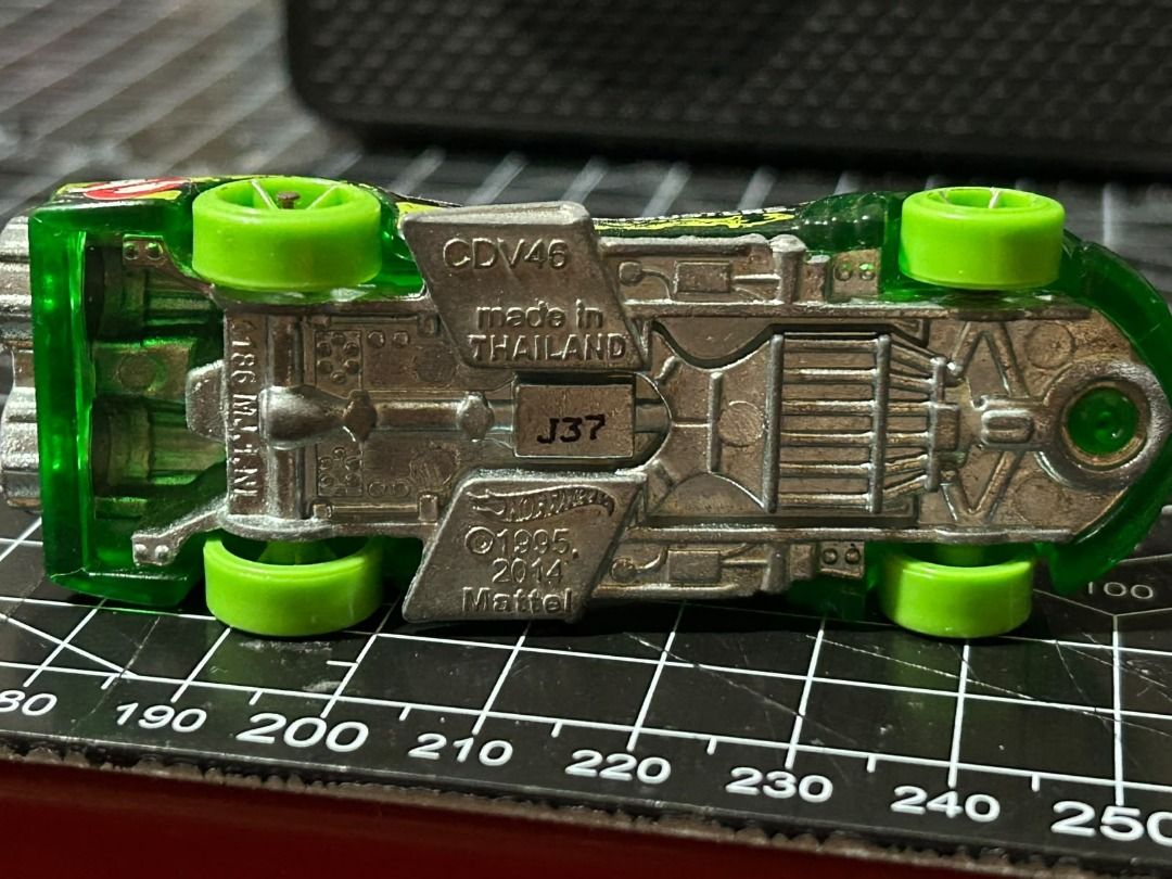 Hot Wheels Ghostbusters Ecto-1 Green Translucent (Category: Vehicle & Diecast Models) located in Las Pinas. Submitted by whatzupriley (Listing ID 1464603618, Image 3). Description: - Green translucent Hot Wheels car - Features Ghostbusters branding - Made in Thailand - Ideal for collectors or playtime.
