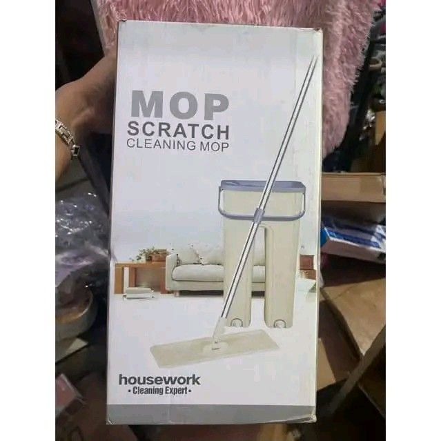 Housework Scratch Cleaning Mop with Self-Wringing Bucket (Category: Cleaning Tools & Supplies) located in Manila. Submitted by berdenmarl01688 (Listing ID 1464748253, Image 2). Description: - Dual-compartment bucket for effortless hands-free washing and drying - Includes highly absorbent microfiber mop pads that trap dirt effectively - Durable stainless steel handle dismantles easily for compact storage - Safe and efficient for all hard floors, t