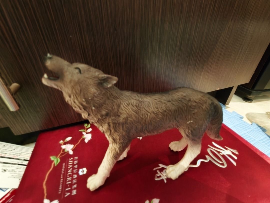 Howling Wolf Figurine Toy Animal Model (Category: Figurines & Statues) located in Manila. Submitted by olxph_674182959 (Listing ID 1464606871, Image 3). Description: - Realistic wolf figurine captured mid-howl - Highly detailed fur and expressive face - Perfect for collectors or as a decorative piece - Stands independently - A fun addition for animal lovers.