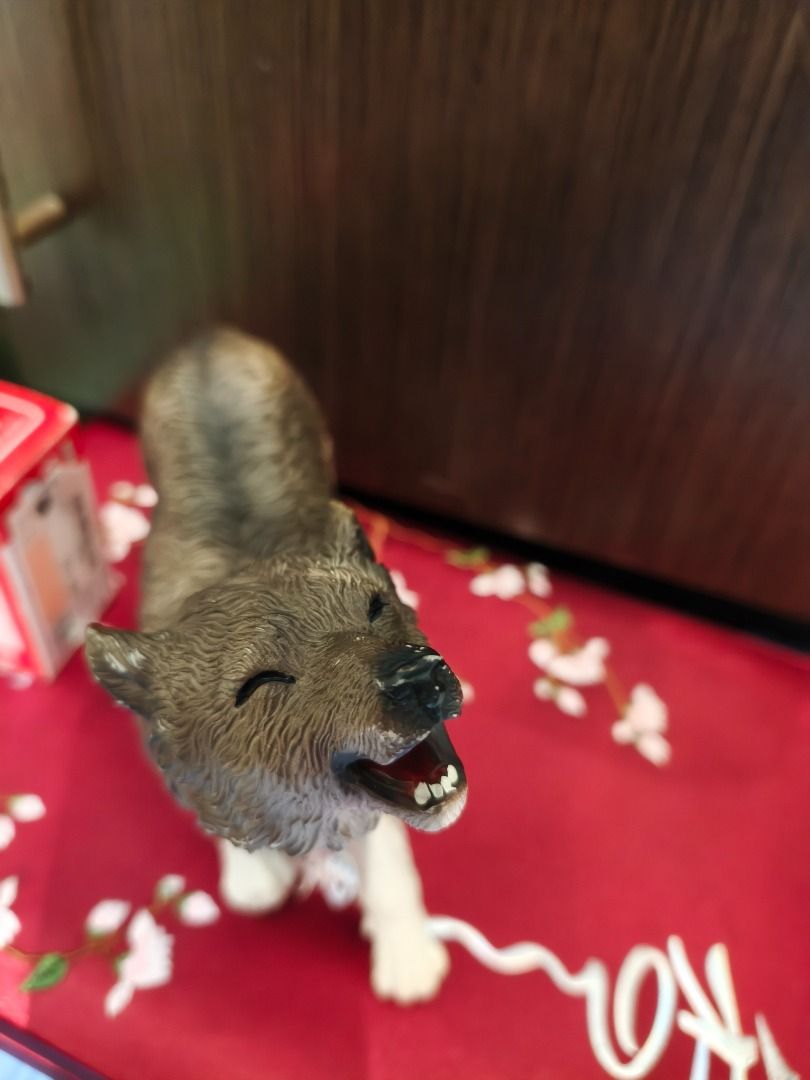 Howling Wolf Figurine Toy Animal Model (Category: Figurines & Statues) located in Manila. Submitted by olxph_674182959 (Listing ID 1464606871, Image 1). Description: - Realistic wolf figurine captured mid-howl - Highly detailed fur and expressive face - Perfect for collectors or as a decorative piece - Stands independently - A fun addition for animal lovers.