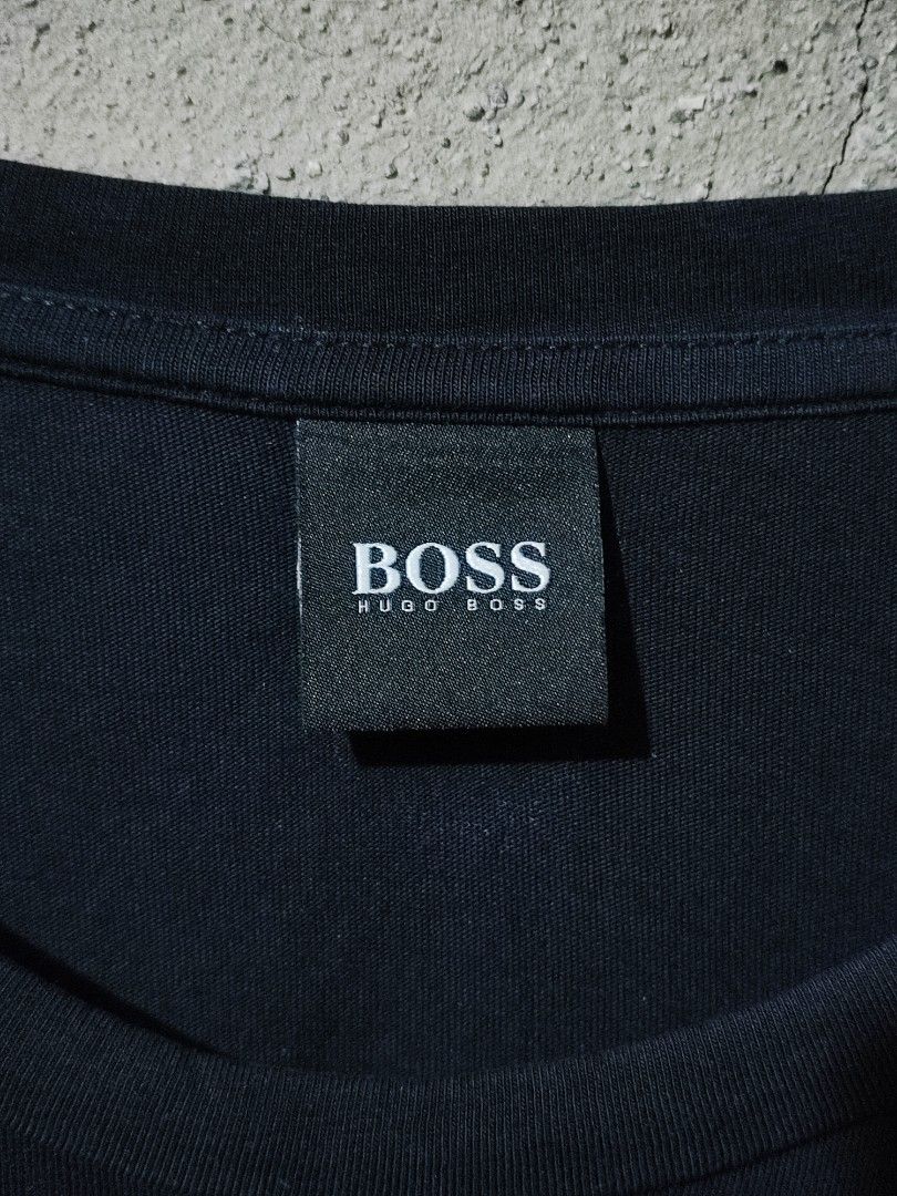 HUGO BOSS VERTICAL STRIPED LOGO TEE (Category: Tshirts & Polo Shirts ) located in Iloilo. Submitted by gooddimes (Listing ID 1464750905, Image 3). Description: Hugo Boss Vertical Striped Logo Tee Authentic Size on tag: Medium Dimes: 20Wx28L Issue/s: None Color rate: 9.8/10 Excellent condition ₱1,200 Reminders: - All items are thrifted, please manage your expectations - Color may vary due to lighting - Please wash before using the item - Due to di