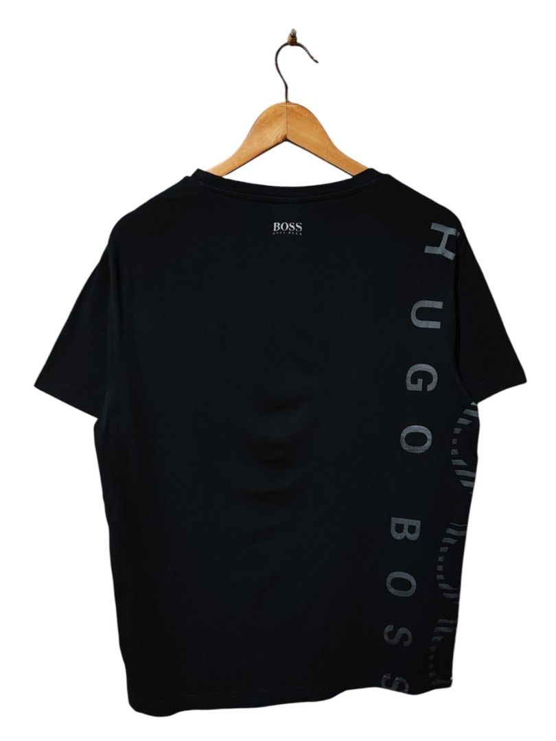 HUGO BOSS VERTICAL STRIPED LOGO TEE (Category: Tshirts & Polo Shirts ) located in Iloilo. Submitted by gooddimes (Listing ID 1464750905, Image 2). Description: Hugo Boss Vertical Striped Logo Tee Authentic Size on tag: Medium Dimes: 20Wx28L Issue/s: None Color rate: 9.8/10 Excellent condition ₱1,200 Reminders: - All items are thrifted, please manage your expectations - Color may vary due to lighting - Please wash before using the item - Due to di