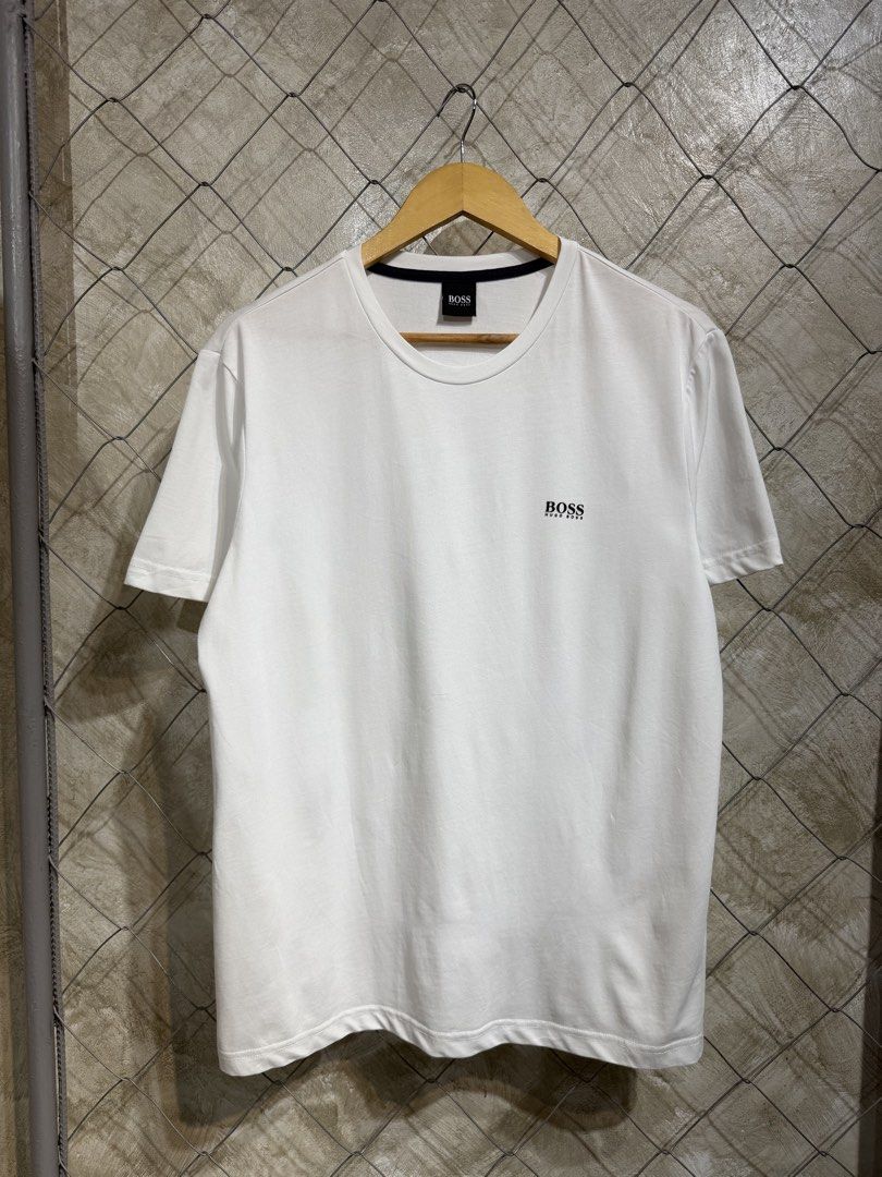 Hugo Boss Chest Logo White Tee. (Category: Tshirts & Polo Shirts ) located in Manila. Submitted by ardobe.mnl (Listing ID 1464747315, Image 1). Description: - Hug Boss Chest Logo White Tee. Size: Medium-Large Dimes: 21x28 Condition: Excellent Flaw: None! Dm for inquiries!.