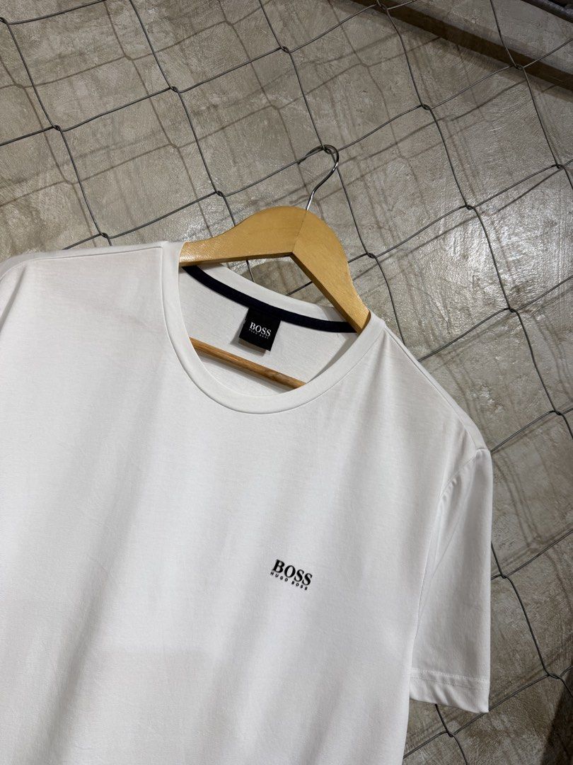 Hugo Boss Chest Logo White Tee. (Category: Tshirts & Polo Shirts ) located in Manila. Submitted by ardobe.mnl (Listing ID 1464747315, Image 2). Description: - Hug Boss Chest Logo White Tee. Size: Medium-Large Dimes: 21x28 Condition: Excellent Flaw: None! Dm for inquiries!.
