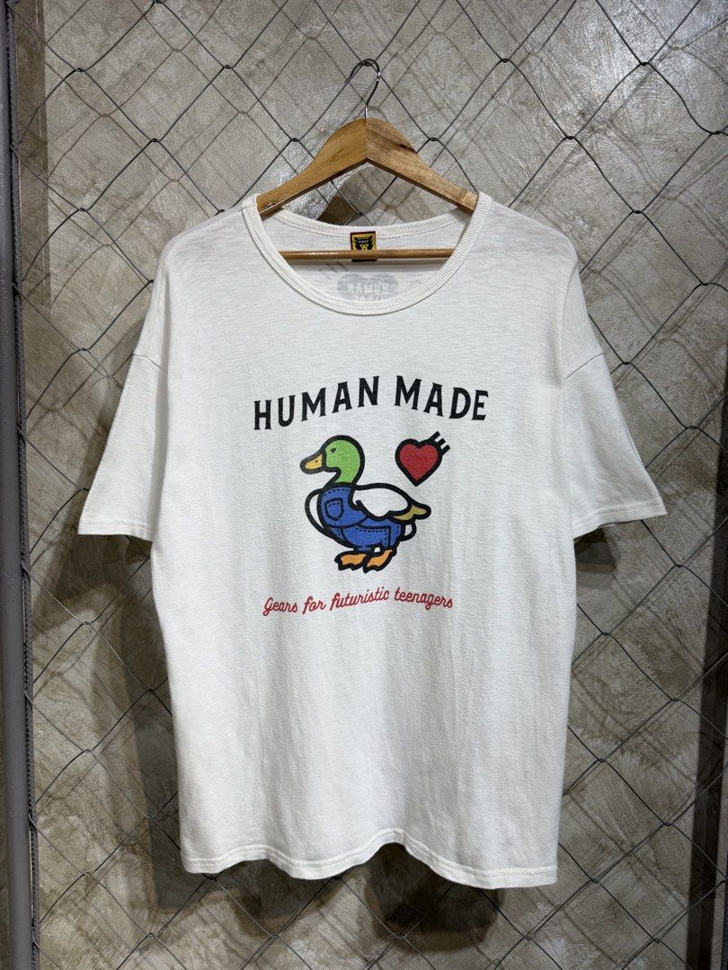 Human Made Duck Graphic T-Shirt White (Category: Tshirts & Polo Shirts ) located in Manila. Submitted by ardobe.mnl (Listing ID 1464747280, Image 1). Description: Human Made Duck Logo White Tee. Size: Large Dimes: 21.5x27.5 Condition: Verygood Flaw: None! Dm for inquiries!.