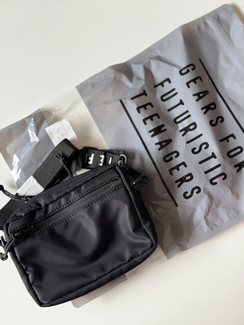 Human Made Military Pouch Mini (Category: Sling Bags) located in Pasay City. Submitted by rjzbrown (Listing ID 1464736917, Image 2). Description: - Brand new in original branded ziplock packaging - Authentic Human Made brown crossbody bag - Features ‘THE FUTURE IS IN THE PAST’ quote on the front strap and adjustable shoulder strap - Designed with multiple secure zippered compartments - Perfect for daily use and streetwear styling.