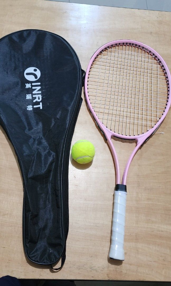 INRT Tennis racket for beginner, pink color (Category: Racket and Ball Sports) located in Baguio. Submitted by coffeesilvershadow_28 (Listing ID 1464686186, Image 1). Description: - From HK box - Brand new, may minimal dent lng. - For beginner tennis racket - Baguio dropping - Jnt shipping- Payment first plus sf before shipping.