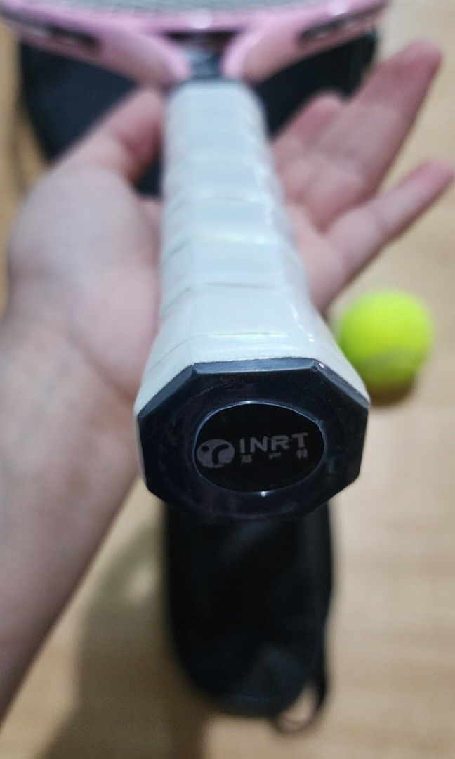 INRT Tennis racket for beginner, pink color (Category: Racket and Ball Sports) located in Baguio. Submitted by coffeesilvershadow_28 (Listing ID 1464686186, Image 3). Description: - From HK box - Brand new, may minimal dent lng. - For beginner tennis racket - Baguio dropping - Jnt shipping- Payment first plus sf before shipping.