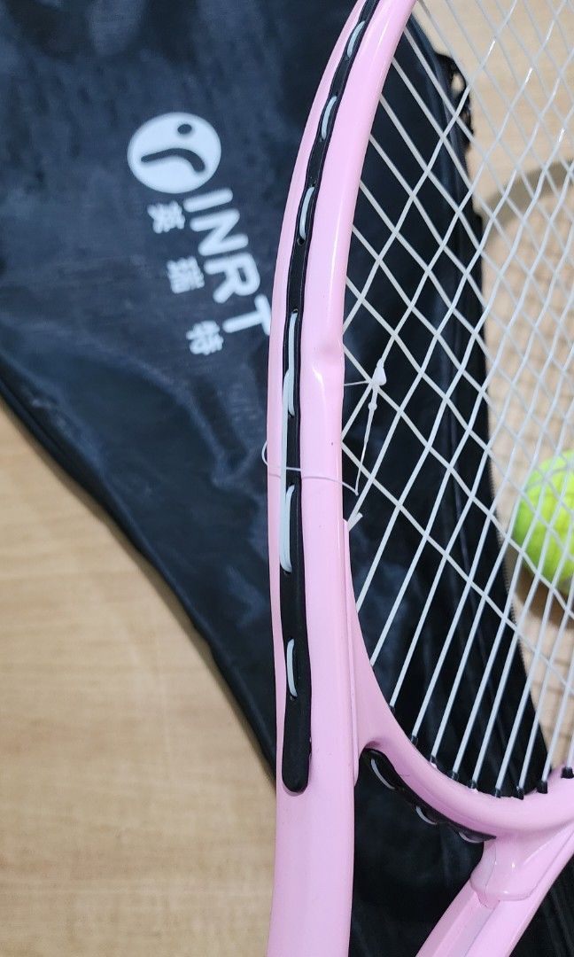 INRT Tennis racket for beginner, pink color (Category: Racket and Ball Sports) located in Baguio. Submitted by coffeesilvershadow_28 (Listing ID 1464686186, Image 2). Description: - From HK box - Brand new, may minimal dent lng. - For beginner tennis racket - Baguio dropping - Jnt shipping- Payment first plus sf before shipping.