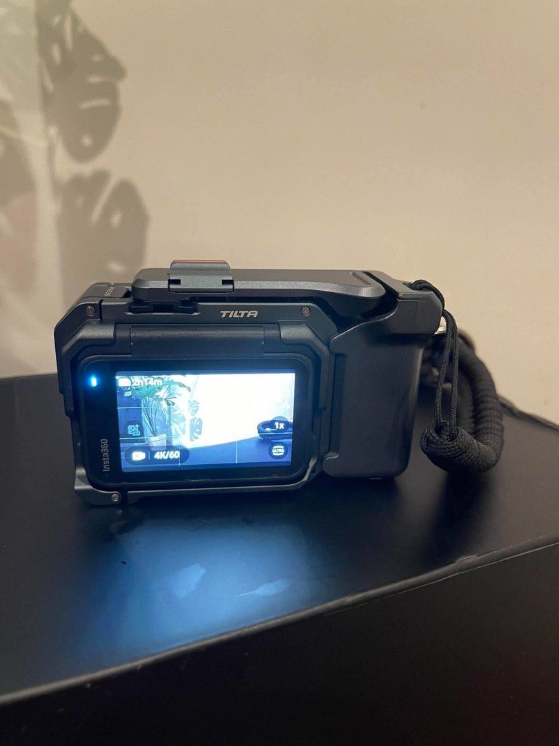 Insta360 Ace Pro 2 Xplorer Grip Kit (Category: Video Cameras) located in Kalibo. Submitted by gneiss2002 (Listing ID 1464702804, Image 2). Description: - Item: Insta360 Ace Pro 2 8K AI-powered action camera with Tilta Xplorer Grip Kit - Inclusion: Original boxes, protective metal cage with hand grip, and black braided wrist strap - Condition: Great setup, screen fully active (shown at 4K/60 settings) - Perfect for: Vlogging, travel, and high-acti