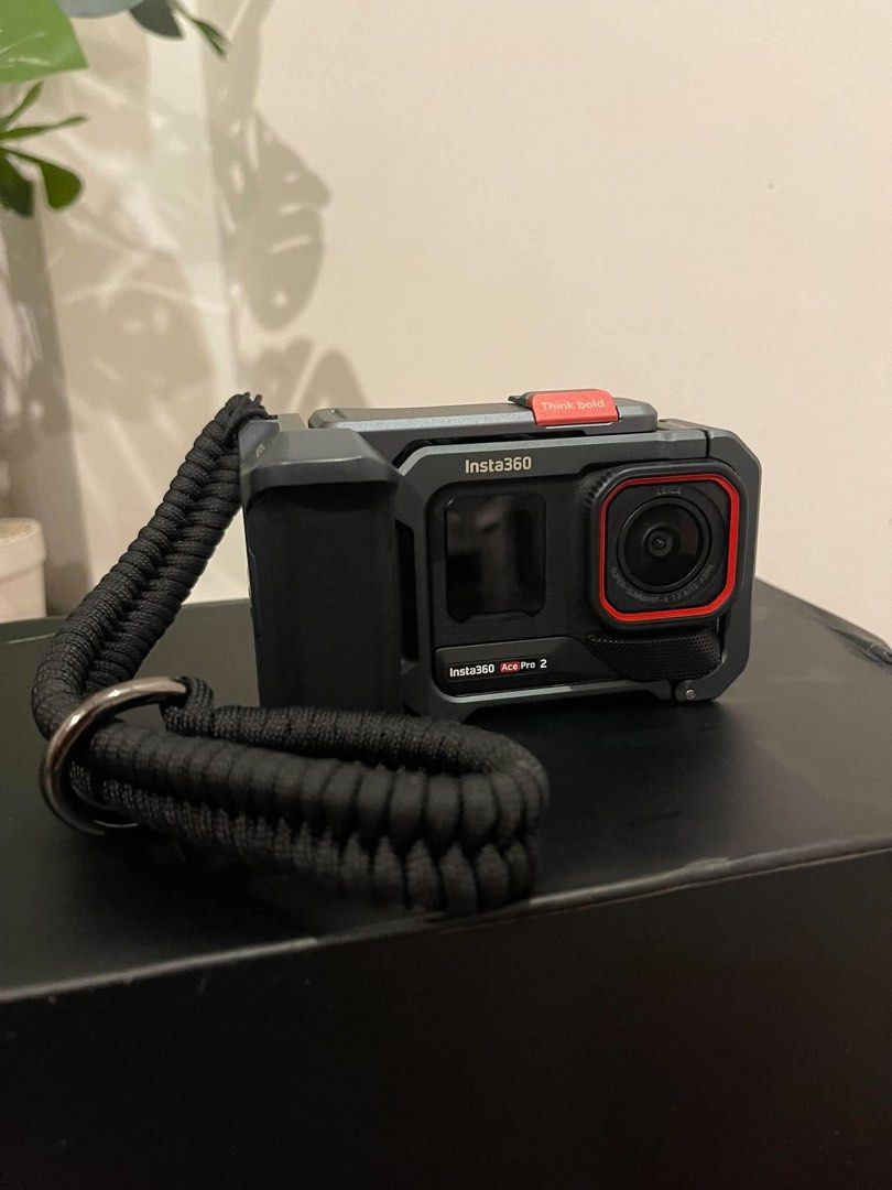 Insta360 Ace Pro 2 Xplorer Grip Kit (Category: Video Cameras) located in Kalibo. Submitted by gneiss2002 (Listing ID 1464702804, Image 3). Description: - Item: Insta360 Ace Pro 2 8K AI-powered action camera with Tilta Xplorer Grip Kit - Inclusion: Original boxes, protective metal cage with hand grip, and black braided wrist strap - Condition: Great setup, screen fully active (shown at 4K/60 settings) - Perfect for: Vlogging, travel, and high-acti