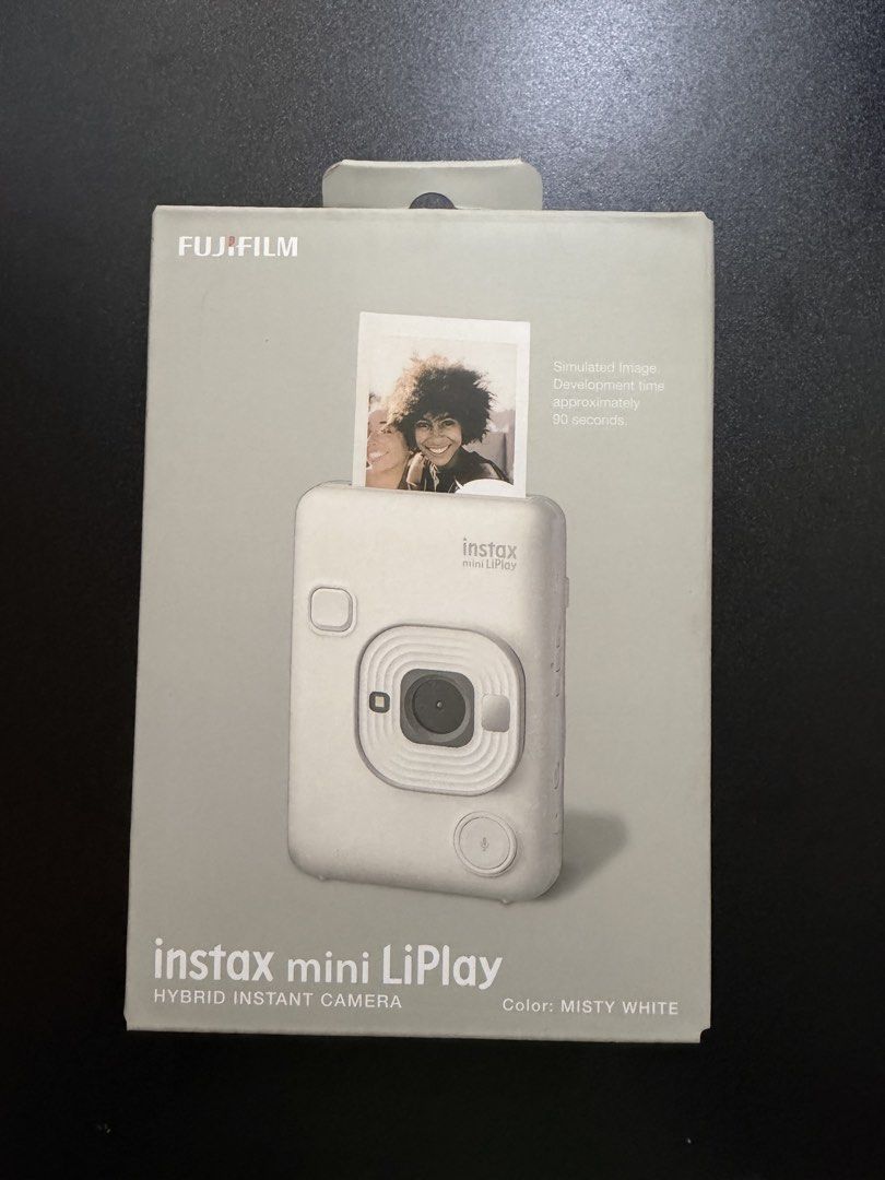 instax Mini LiPlay (White) (Category: Cameras) located in Quezon City. Submitted by blueberrie03 (Listing ID 1463790456, Image 3). Description: - 9/10 still in good condition - 1 year old, used few times and safely stored only - With screen protector - Camera case and 32gb SD card included - with box - RFS: barely used, have other cameras.