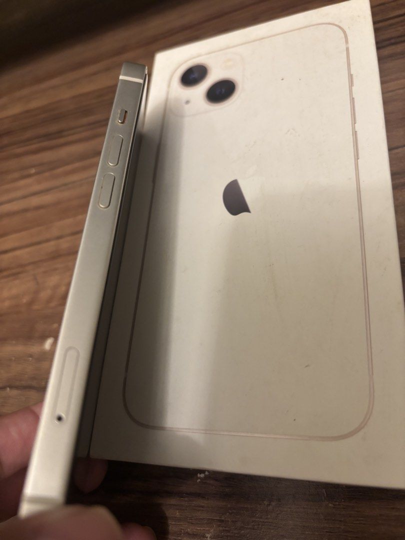 Iphone 13 (Category: iPhone 13 Series) located in Quezon City. Submitted by irresistiblebam (Listing ID 1464714318, Image 3). Description: Color: white really fresh and never damaged Lady owner 77% batt health With screen nd camera protector Just the unit and box No dents or any issues just upgrading Freebie: Pink camera case.