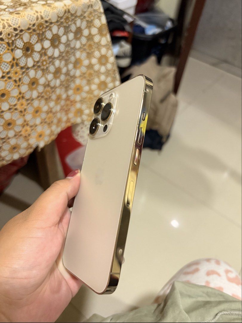 iPhone 13 pro | 128gb GOLD 🌟 (Category: iPhone 13 Series) located in Manila. Submitted by marthina246 (Listing ID 1464590758, Image 2). Description: IOS 26.6.1 - factory unlocked - NTC approved - any sim - 72% BH orig battery (makunat) - minor scratches, smooth performance, over all no issue (lady owned) - all parts are original, never been opened or repair - ALL WORKING AND NO HIDDEN ISSUES inclusions: - unit (iphone13pro gold 128gb) - original