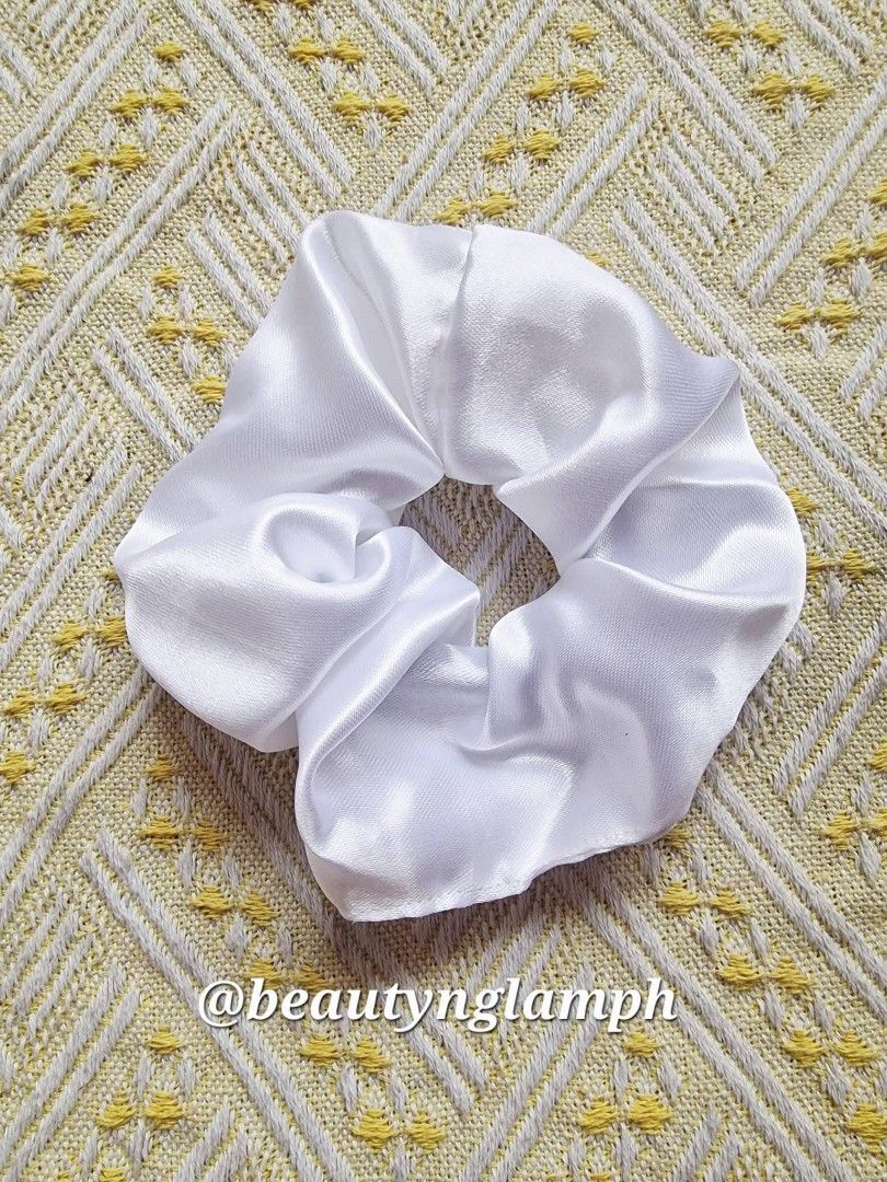 Ivory White Big Satin Scrunchies (Category: Hair) located in Quezon City. Submitted by floreskari78555 (Listing ID 1464683098, Image 2). Description: Classic, silky, and oh-so-versatile. 🕊️ Our Ivory White Big Satin Scrunchies are an absolute staple. Perfect for: ✨ Bridesmaid proposals ✨ Corporate giveaways ✨ Rebranding your business 🛍️ Retail & wholesale available! DM us to order yours today..