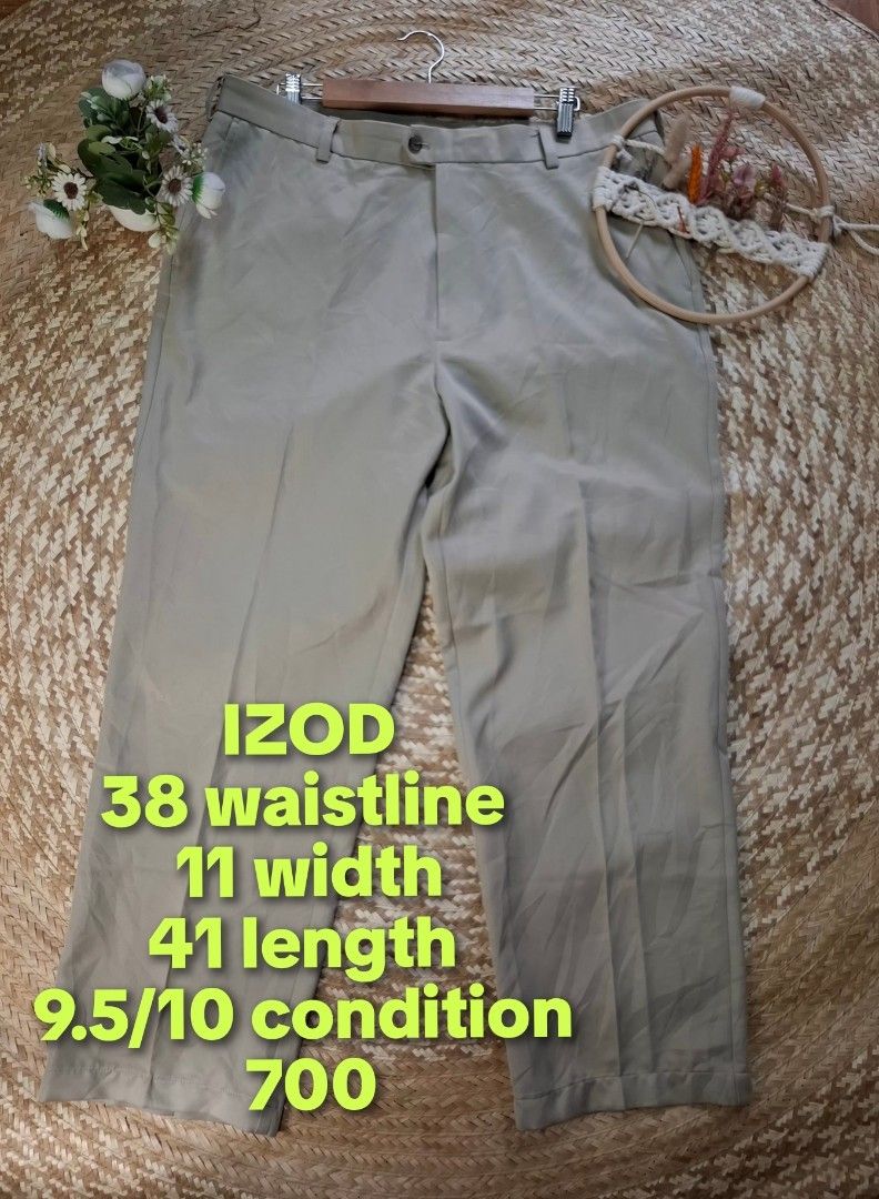IZOD Golf Khaki Pants Size 38x32 (Category: Chinos) located in Bulacan. Submitted by cathycampo51092 (Listing ID 1464756181, Image 1). Description: IZOD golf pants in khaki beige. Tag size 38 waist, 32 length. Measured flat: 38 waistline, 11 width, 41 length. Two back pockets with button closure on one. Interior lining and pocket construction shown in photos. Classic straight leg cut for golf or casual wear..
