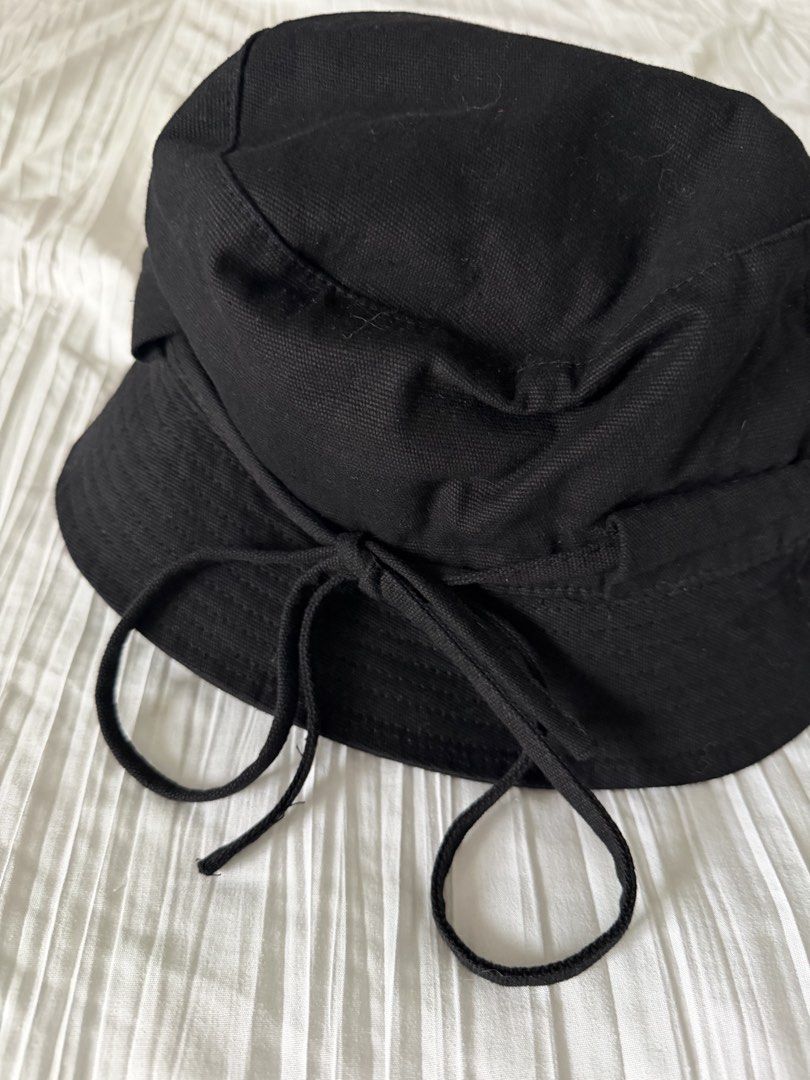 Jacquemus Bucket Hat (Category: Hats & Beanies) located in Makati City. Submitted by miarchives (Listing ID 1464637610, Image 3). Description: 🍒 jacquemus bucket hat, authentic :) pls not the stain in front 🛒 P1000, gcash/qrph only 🚛 grab / lalamove only 💵 sf shouldered by buyer.