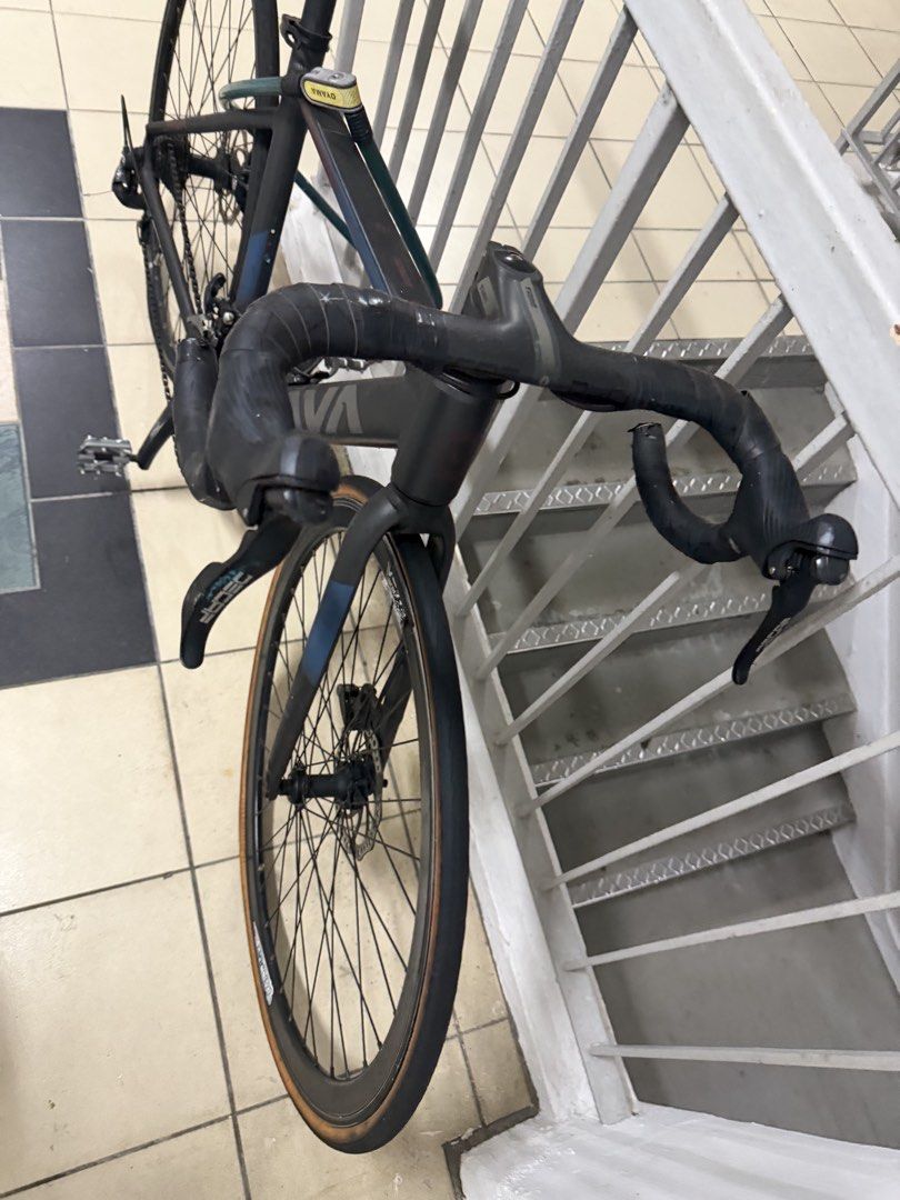 Java road bike (Category: Bicycles) located in Singapore. Submitted by qeekhan24189 (Listing ID 1464679850, Image 4). Description: - java road bike - Dark grey frame with blue accents - Equipped with disc brakes - Features drop handlebars -new tires -new brakes.