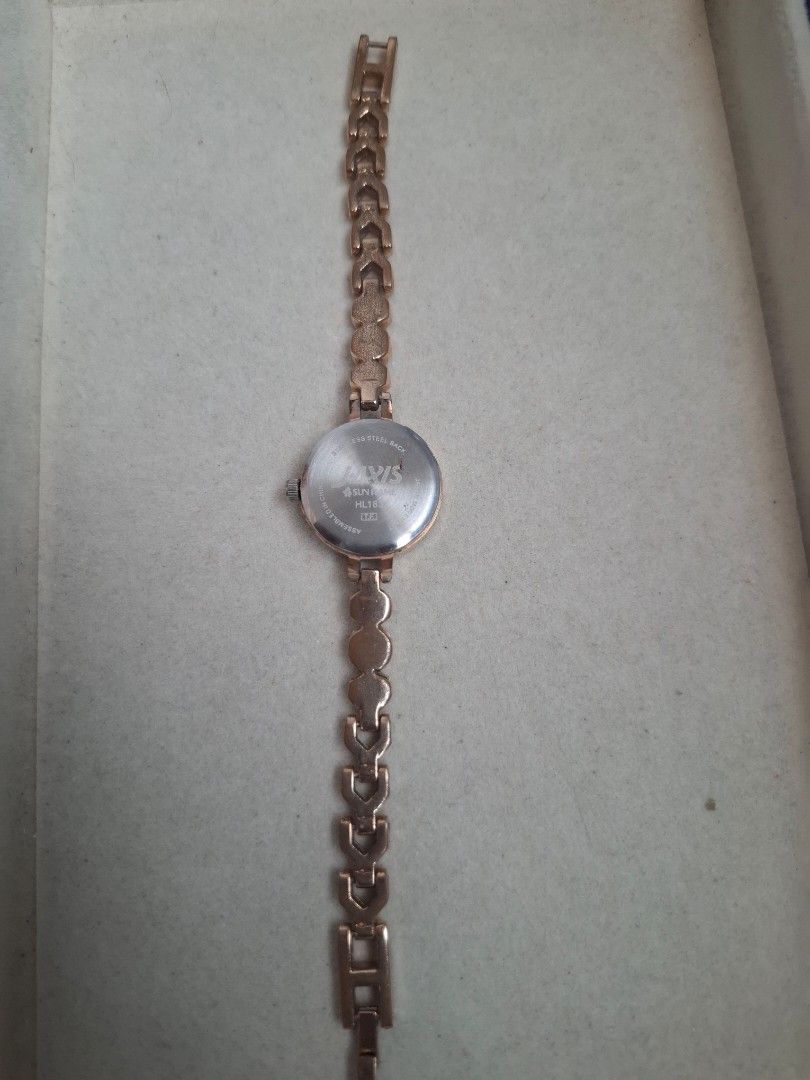 J-axis Sun Flame Watch (Category: Women's Watches) located in Abucay. Submitted by icia_marie18 (Listing ID 1464582369, Image 3). Description: J-Axis Sun Flame Watch issue: major fadings and sign of usage best fit for 6 inches wrist rose gold color japan movement.