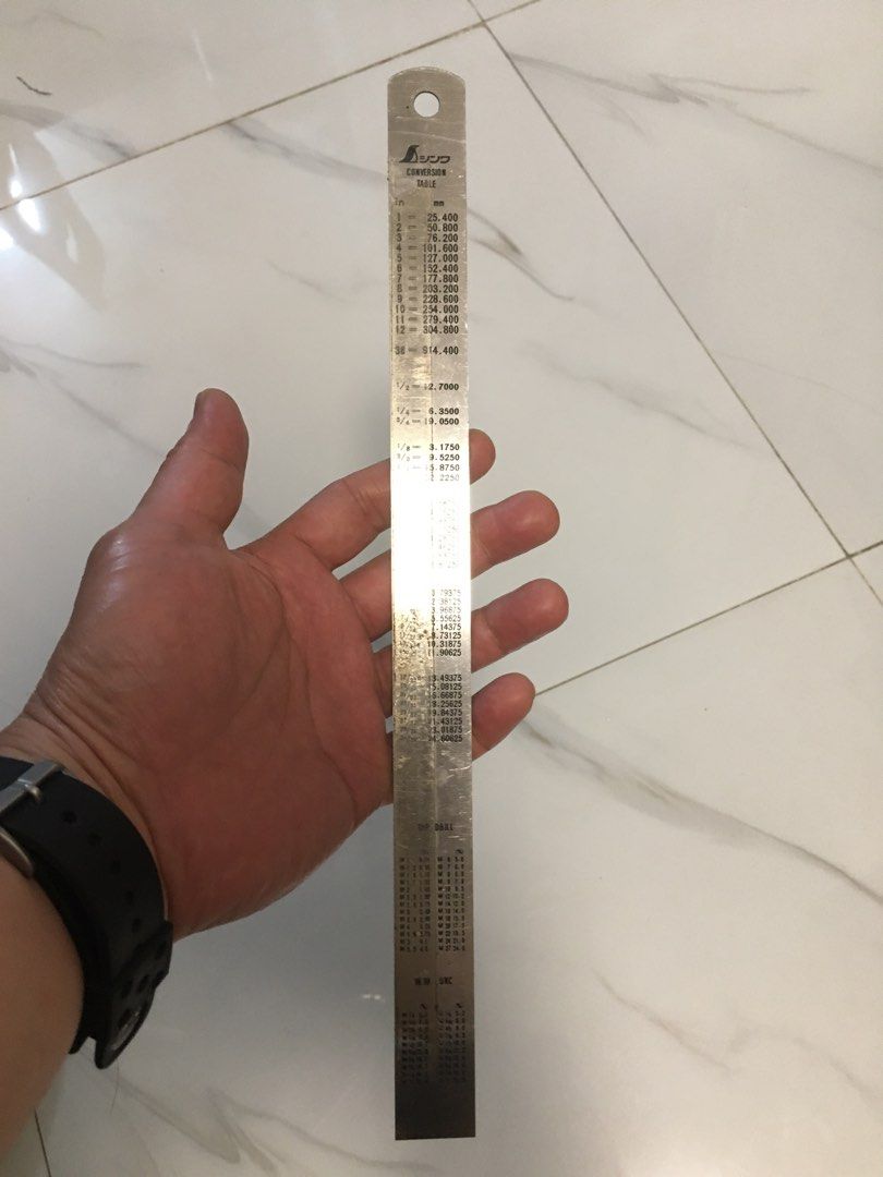 JEDO Stainless Steel Ruler with Conversion Table (Category: Stationery & School Supplies) located in Pasay City. Submitted by gilbertso62551 (Listing ID 1464662753, Image 1). Description: - JEDO Stainless Steel Ruler - 300mm (12 inches) length - Built-in conversion table: inches to mm - Includes tap drill size chart - Made of durable stainless steel - Ideal for precise measurements and calculations - Perfect for workshops, DIY projects, or office