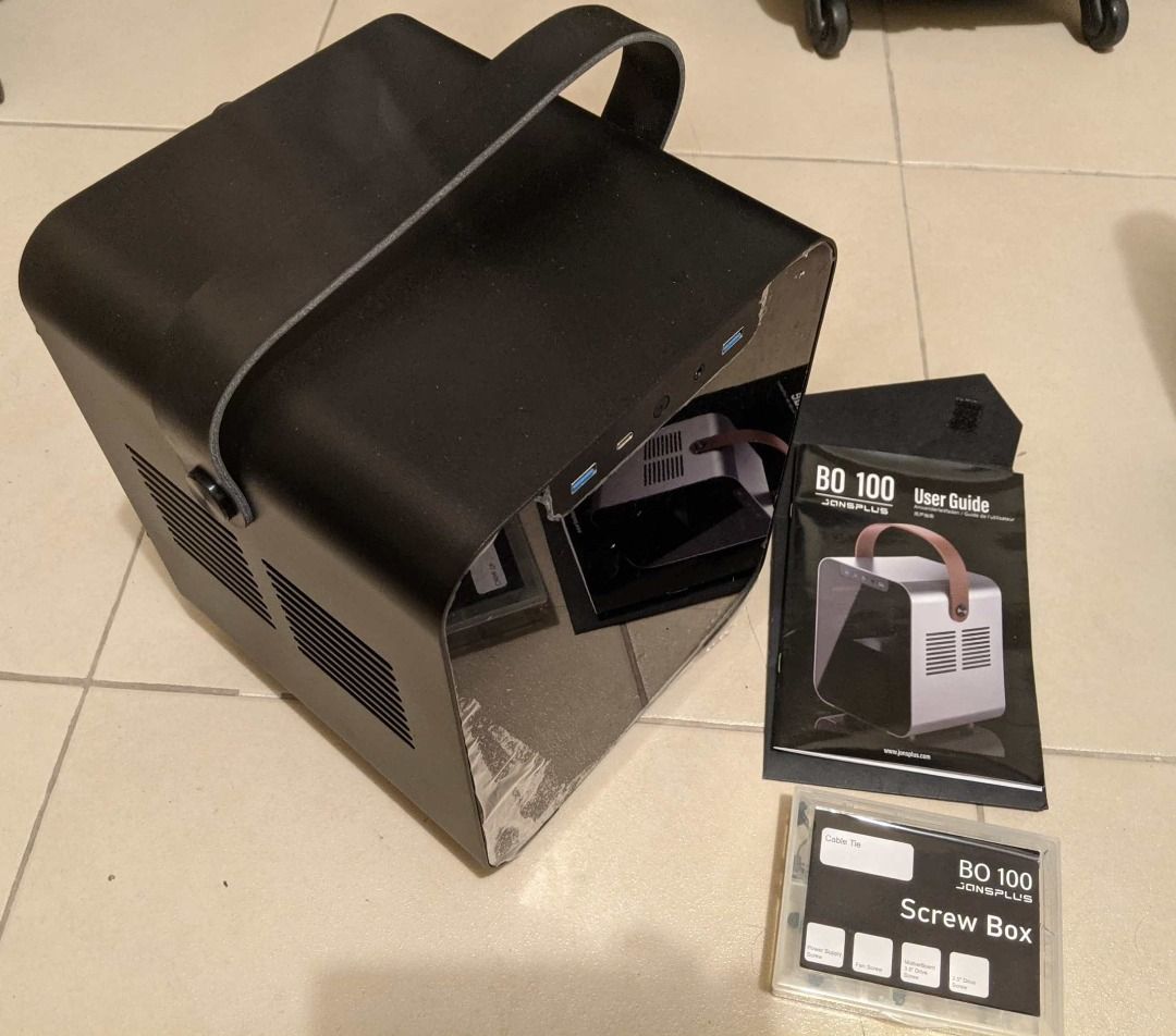 Jonsplus BO 100 Mini-ITX PC Case (Category: Desktops) located in Makati City. Submitted by catalinolilia (Listing ID 1464754240, Image 3). Description: - Model: Jonsplus BO 100 Mini Tower Case (Black) - Material: Premium aluminum construction with a sleek tinted glass front panel - Portability: Features a sturdy carrying handle on top - Design: Fully modular inner chassis that pulls right out for hassle-free building and cable management - Inclus