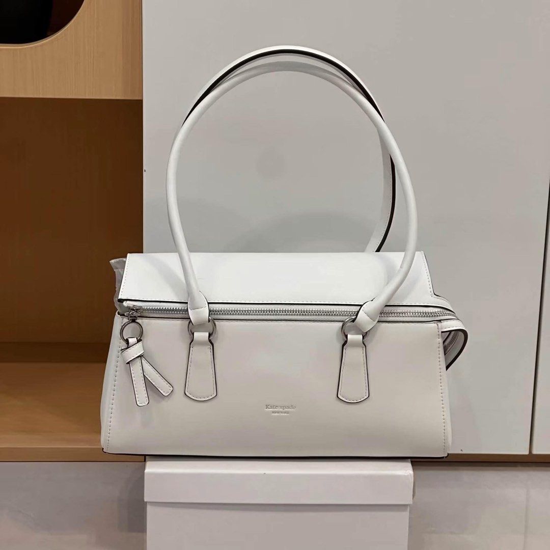 Kate spade Bond Leather Shoulder Bag (Category: Shoulder Bags) located in Quezon City. Submitted by stuffs.hellyy (Listing ID 1464745638, Image 2). Description: Size:13x7.5x3.5 inches With dust bag&serial number .