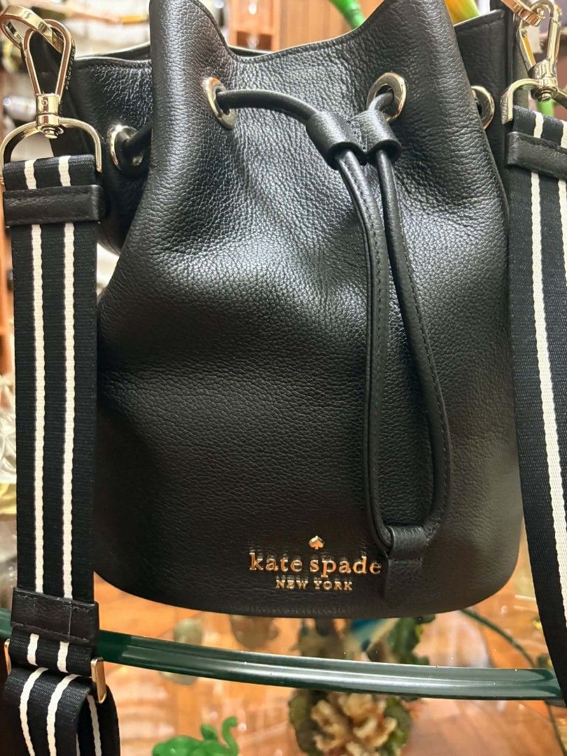 Kate Spade Mini Bucket Bag (Category: Shoulder Bags) located in Makati City. Submitted by emem.pre.owned.ph (Listing ID 1464585784, Image 3). Description: -kate spade mini bucket -pure leather -excellent condition -with dustbag -bougth US.