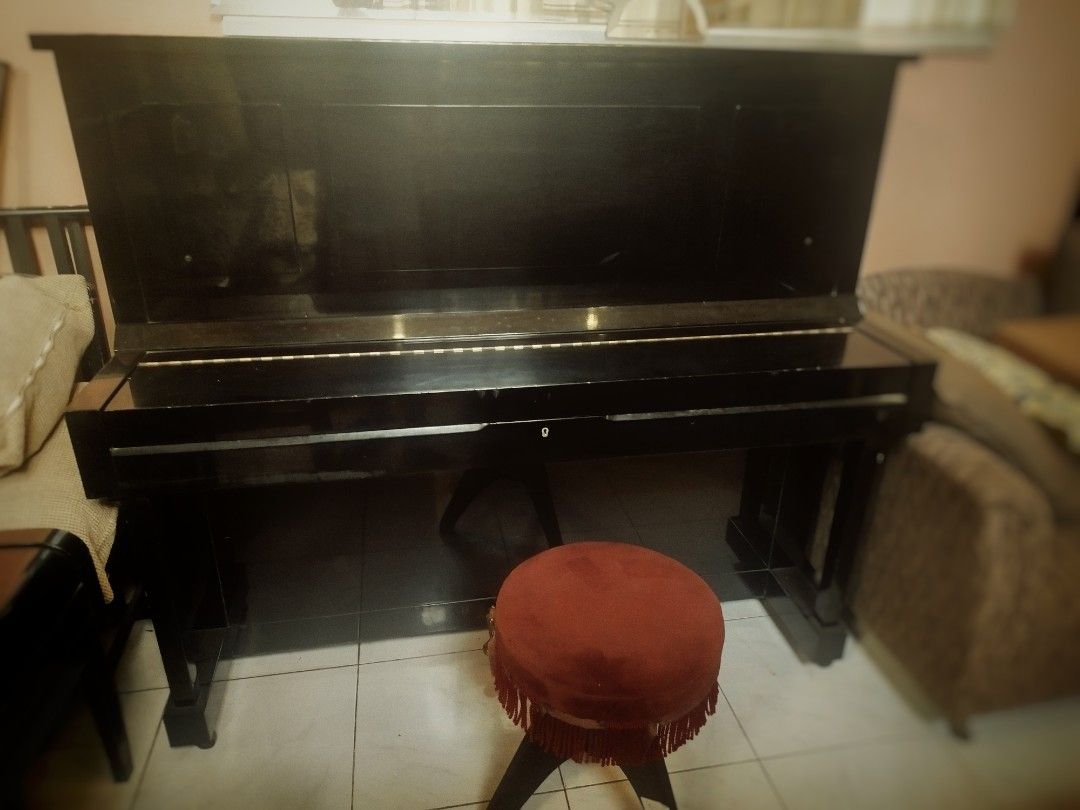Kawai Upright Piano - Model K.35 (Category: Musical Instruments) located in Caloocan City. Submitted by psalloph (Listing ID 1464659062, Image 3). Description: Japan-made Kawai upright, cleaned, tuned, and ready to play. The K-35 is a reliable mid-range model known for its balanced tone — great for students, hobbyists, and serious players alike. CONDITION • Exterior: Minor scratches and dents — visible but doesn't affect playability • Keys: Compl