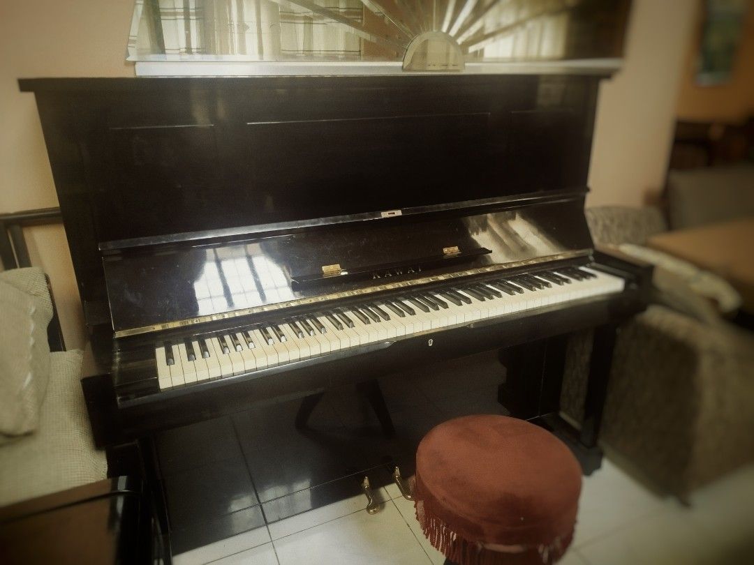 Kawai Upright Piano - Model K.35 (Category: Musical Instruments) located in Caloocan City. Submitted by psalloph (Listing ID 1464659062, Image 1). Description: Japan-made Kawai upright, cleaned, tuned, and ready to play. The K-35 is a reliable mid-range model known for its balanced tone — great for students, hobbyists, and serious players alike. CONDITION • Exterior: Minor scratches and dents — visible but doesn't affect playability • Keys: Compl