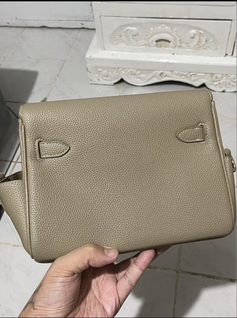 Kelly Messenger Inspired (Category: Sling Bags) located in Manila. Submitted by declutterbyron (Listing ID 1464607894, Image 3). Description: - Selling my Pre Owned Kelly Messenger PS. This is only inspired from the authentic one - full leather bag - comes with strap only no other inclusion Taguig City location during Tuesday till Sat San Pedro location during Sun and Mon.