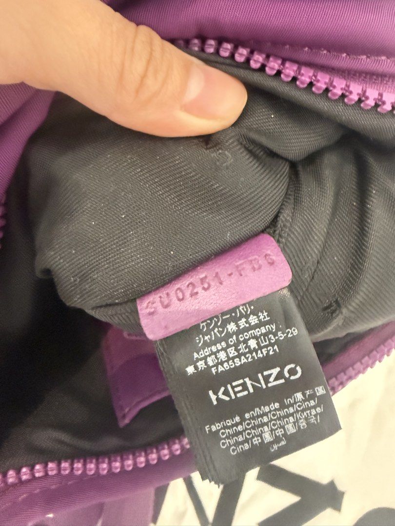 Kenzo Purple Logo Beltbag (Category: Purses & Pouches) located in Angeles City. Submitted by bagpriceinfiniteluck (Listing ID 1464734145, Image 2). Description: Stands out with its textured mesh front pocket and a diagonal logo branding Fits big phones : iphone promax, adjustable sling. READY FOR SHIPPING🇵🇭🇵🇭 Thank you. God Speed.