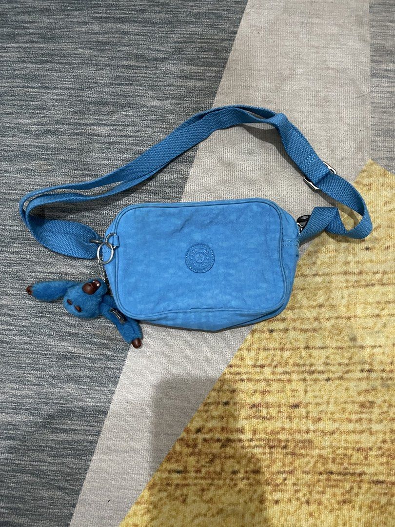 Kipling Blue Crossbody Bag with Monkey Charm (Category: Cross-body Bags) located in Marikina City. Submitted by caseydreyes (Listing ID 1464594829, Image 1). Description: - no issues - like new and guaranteed authentic - never been used - bought this from the US - rfs: impulse buy/decluttering.
