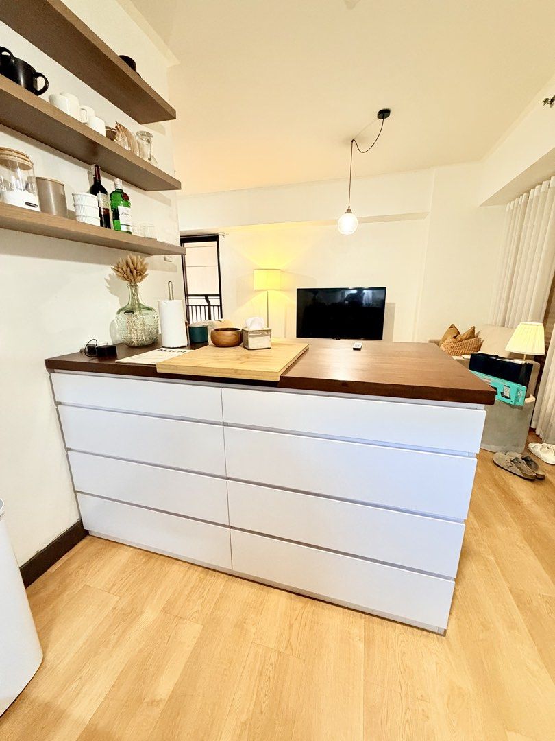 Kitchen Island (Category: Bathroom & Kitchen Fixtures) located in Taguig. Submitted by boxedgoodies (Listing ID 1464600078, Image 1). Description: - Solid Mahogany wood in Walnut finish - Drawers are soft close - Bar stools not included.