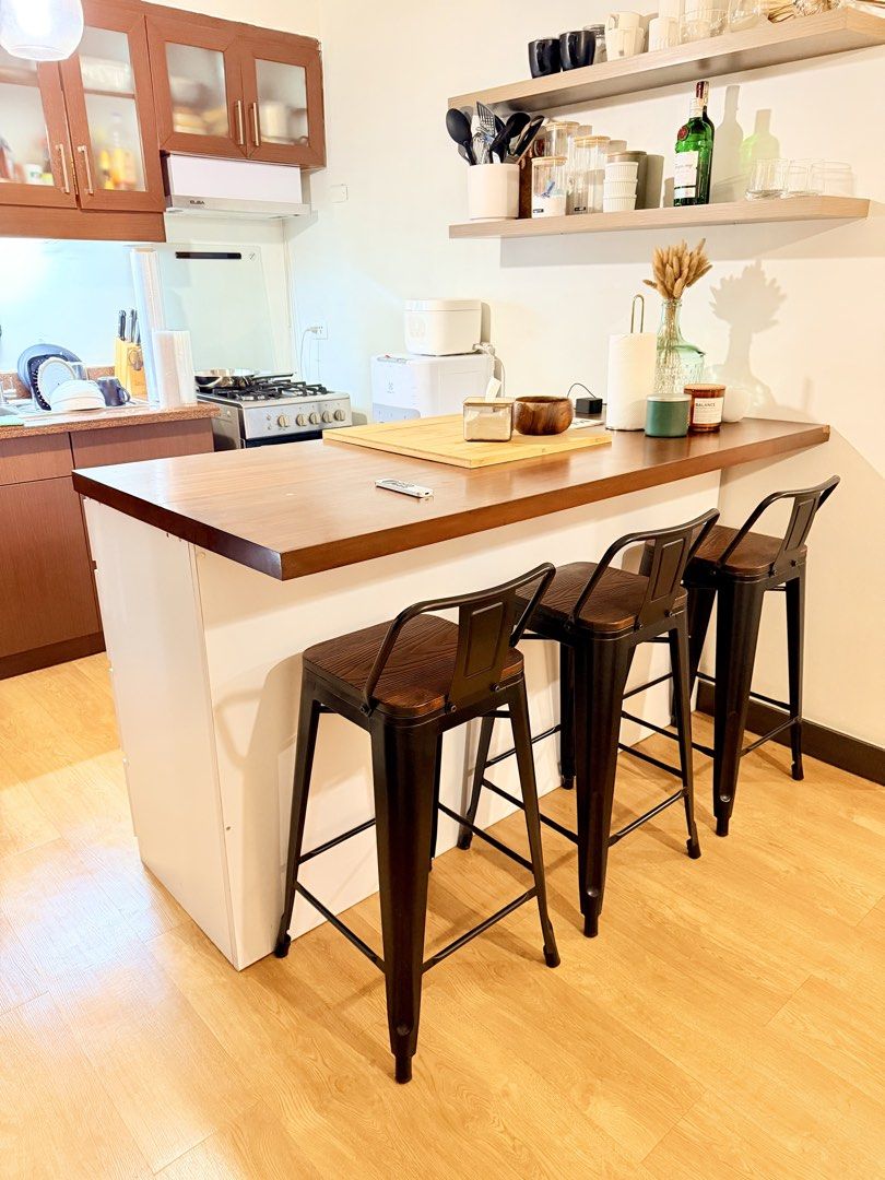 Kitchen Island (Category: Bathroom & Kitchen Fixtures) located in Taguig. Submitted by boxedgoodies (Listing ID 1464600078, Image 2). Description: - Solid Mahogany wood in Walnut finish - Drawers are soft close - Bar stools not included.