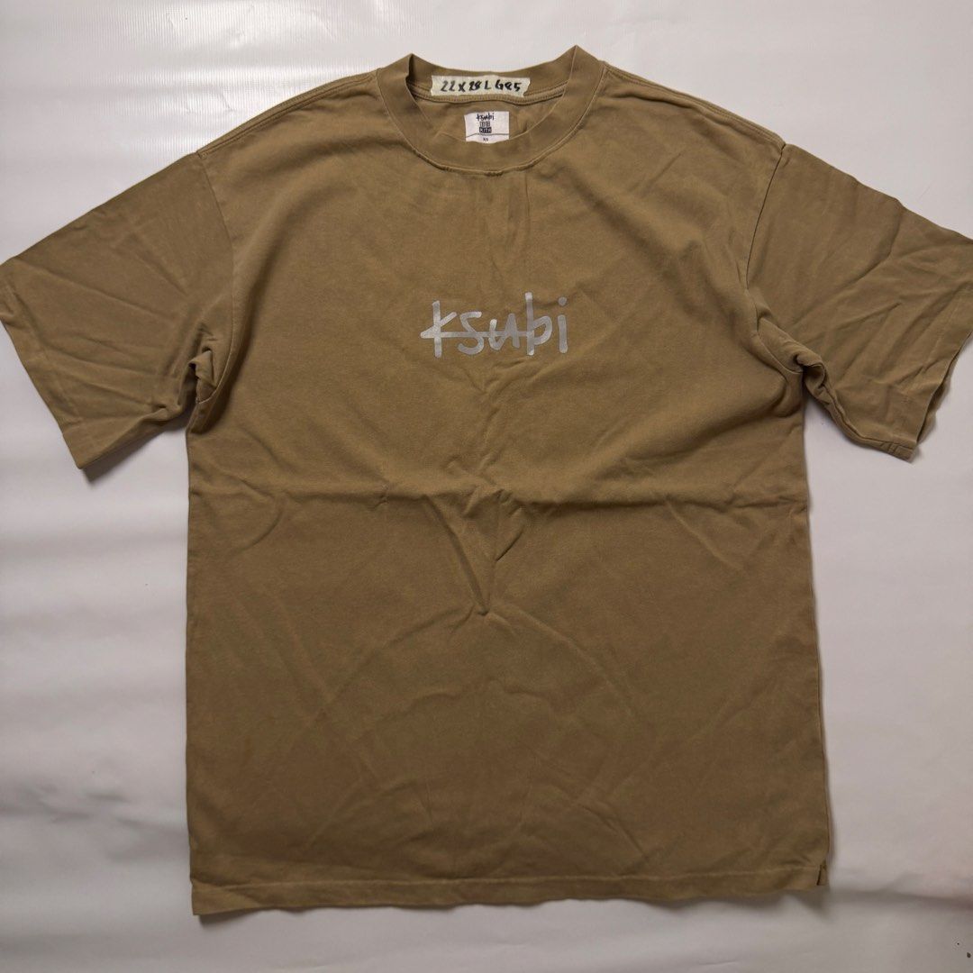 Kith x Ksubi Brown T-Shirt (Category: Tshirts & Polo Shirts ) located in Manila. Submitted by johnedel_james (Listing ID 1464709511, Image 1). Description: - Brand: Kith x Ksubi Collaboration - Color: Khaki Brown - Size: XS - Material: 100% Cotton - Design: Center Ksubi chest logo graphic - Details: Original collaboration neck label intact - Care: Hand wash recommended.