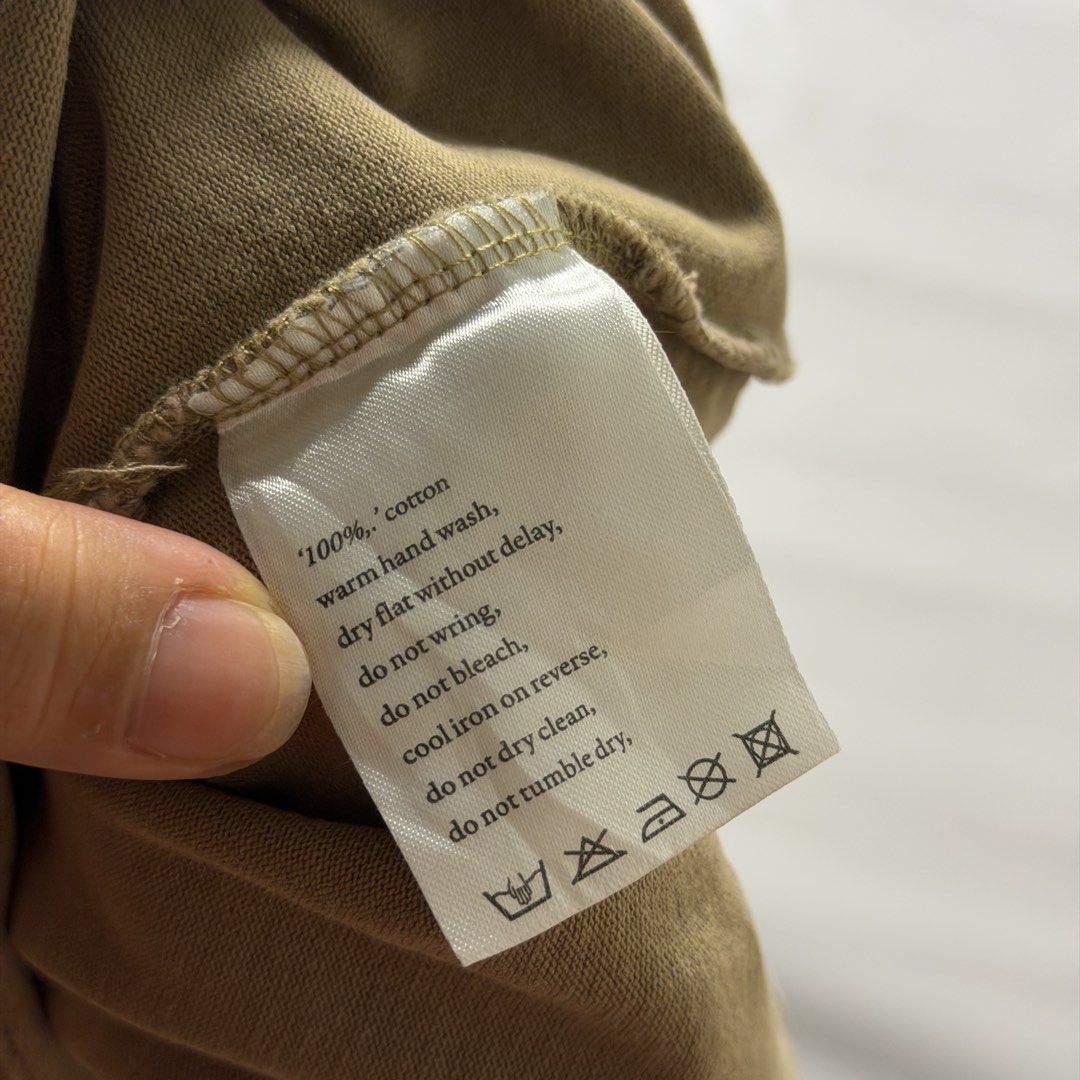 Kith x Ksubi Brown T-Shirt (Category: Tshirts & Polo Shirts ) located in Manila. Submitted by johnedel_james (Listing ID 1464709511, Image 3). Description: - Brand: Kith x Ksubi Collaboration - Color: Khaki Brown - Size: XS - Material: 100% Cotton - Design: Center Ksubi chest logo graphic - Details: Original collaboration neck label intact - Care: Hand wash recommended.