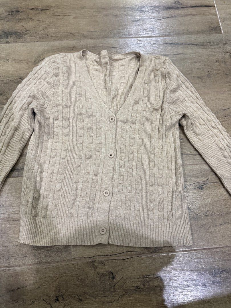 Knitted Cardigan for women (Category: Coats, Jackets and Outerwear) located in Tagaytay City. Submitted by prelovedbytmj (Listing ID 1464760973, Image 1). Description: Knitted Cardigan for women. Size Small. Color Beige. Very light. Soft cotton.