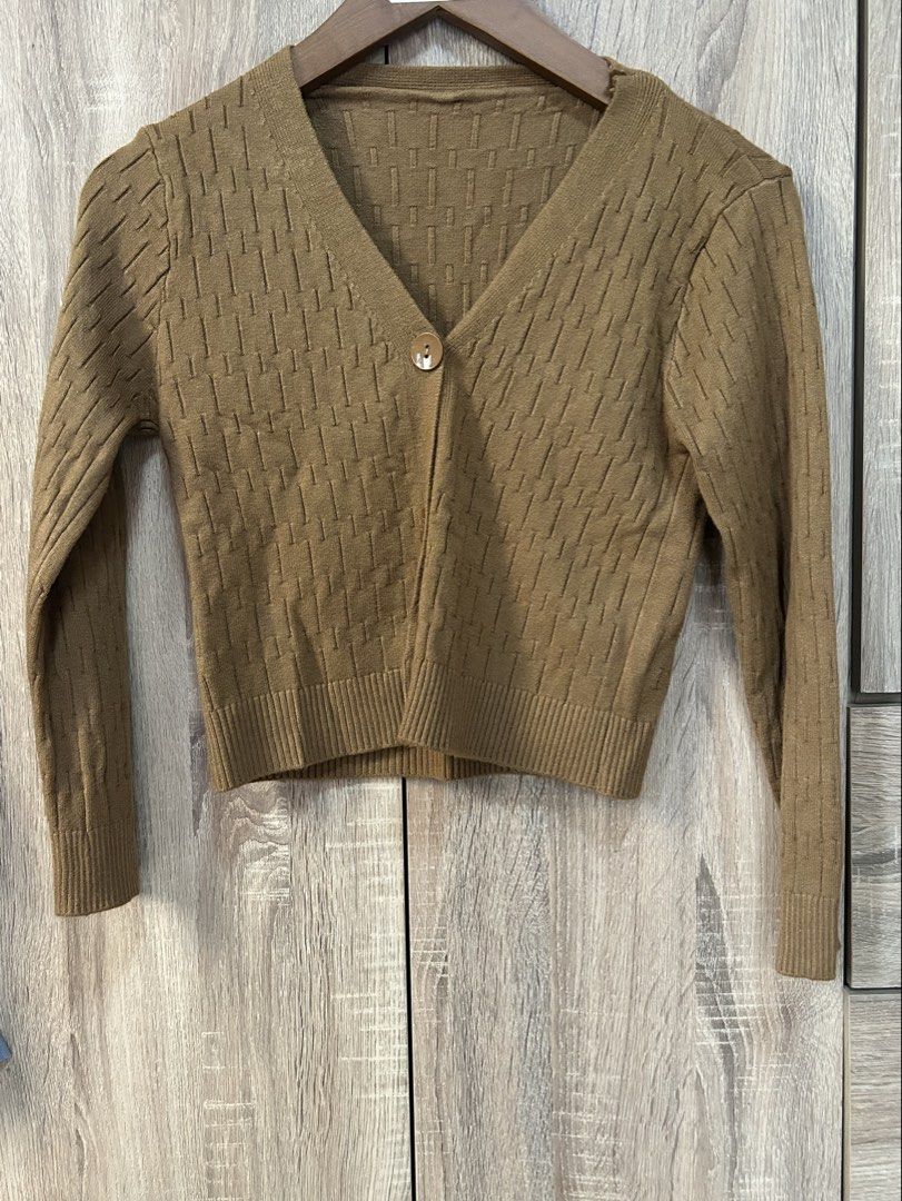 Knitted Jacket (Category: Coats, Jackets and Outerwear) located in Bulacan. Submitted by relove.re (Listing ID 1464762894, Image 1). Description: - Brown - Xs to S - Knitted with texture design - Semi crop top - with Buttons - Sexy outfit for casual day or night.