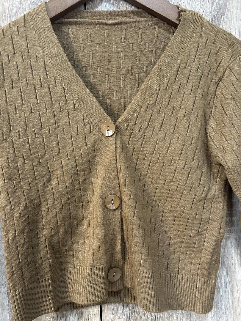 Knitted Jacket (Category: Coats, Jackets and Outerwear) located in Bulacan. Submitted by relove.re (Listing ID 1464762894, Image 3). Description: - Brown - Xs to S - Knitted with texture design - Semi crop top - with Buttons - Sexy outfit for casual day or night.