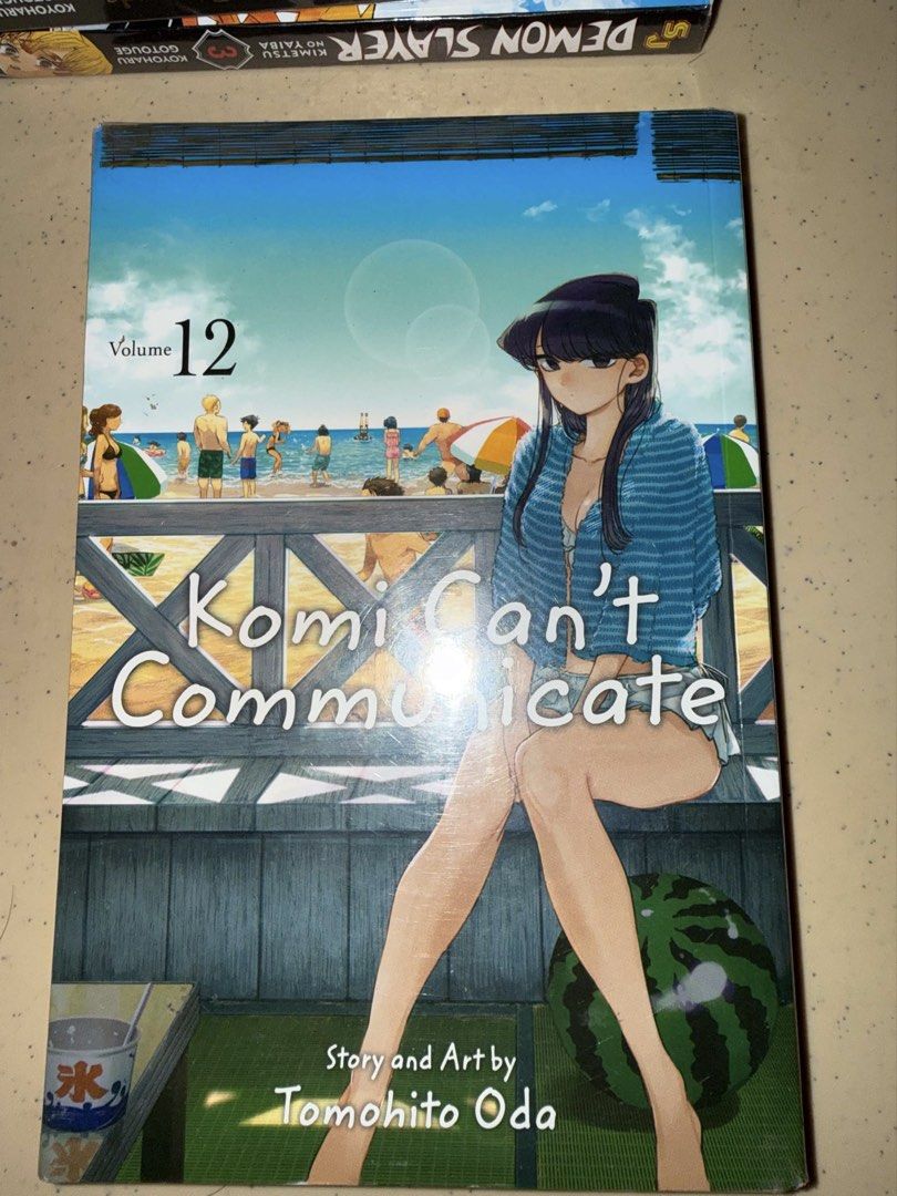 Komi Can't Communicate Volume 12 Manga (Category: Comics & Manga) located in Talisay. Submitted by yourstrulyfinn (Listing ID 1464717390, Image 1). Description: - Title: Komi Can't Communicate (Volume 12) - Author/Illustrator: Tomohito Oda - Publisher: Viz Media - Format: English manga paperback - Cover: Beach-themed art featuring Shoko Komi - Condition: Clean inside pages, great for collection What you see is what you get. Loc: Cebu.