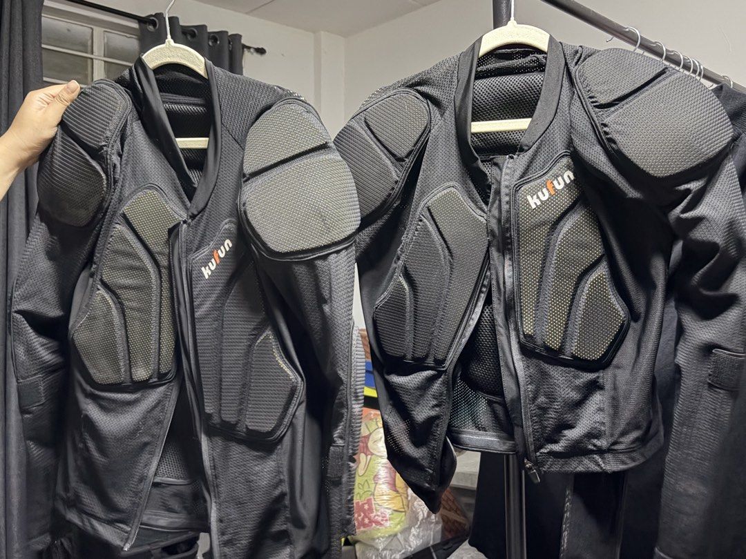Kufun Motorcycle Body Armor Jacket Protective Gear (Category: Coats, Jackets and Outerwear) located in Manila. Submitted by finderskeepersmnl_092026 (Listing ID 1464745548, Image 1). Description: Kufun protective motorcycle armor jacket. Heavy-duty padding on shoulders, chest, and back. Black mesh fabric keeps airflow steady during rides. Sturdy zipper down the front. Orange snowflake logo printed on the back panel. Multiple articulated pads abso